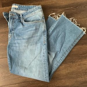 Mavi light wash distressed hem jeans